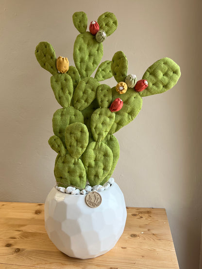 Opuntia in wool fabric complete with white ceramic vase and decorative stones.