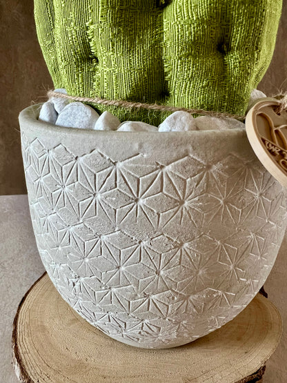Opuntia in wool fabric complete with white ceramic vase and decorative stones.