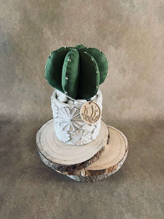 Composizione ricamata in cotone verde scuro, vaso in cemento con motivi a fiore, h circa 20