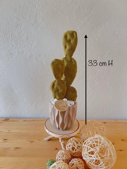 Opuntia in wool fabric complete with white ceramic vase and decorative stones.